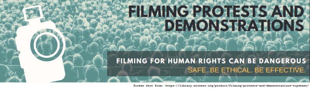 Poster for Documenting the Now. Poster has an image of a camera with a crowd in the background. The text reads "Filming Protests and Demonstrations: Filming for Human Rights Can be Dangerous. Safe. Be Ethical. Be Effective."