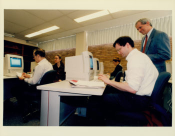 Users sitting in front of cathode-ray tube (CRT) monitors in Olin Library's then-new PC Lab circa the mid-90s. 