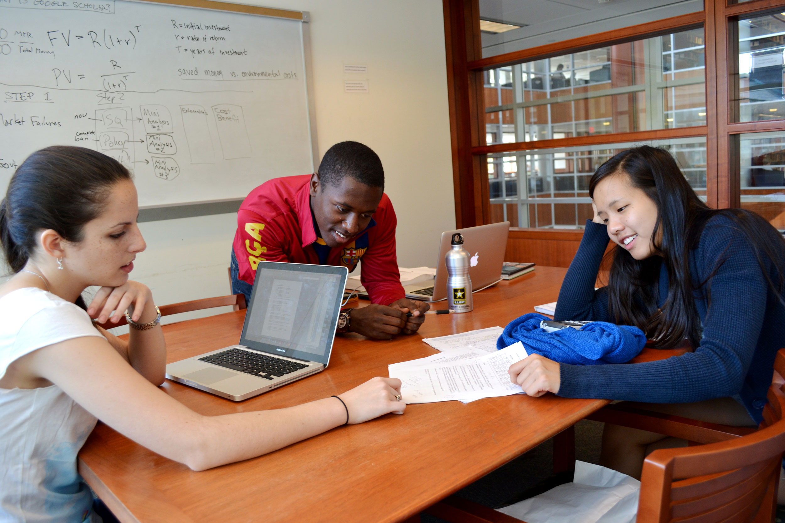 Students utilizing Library study rooms.