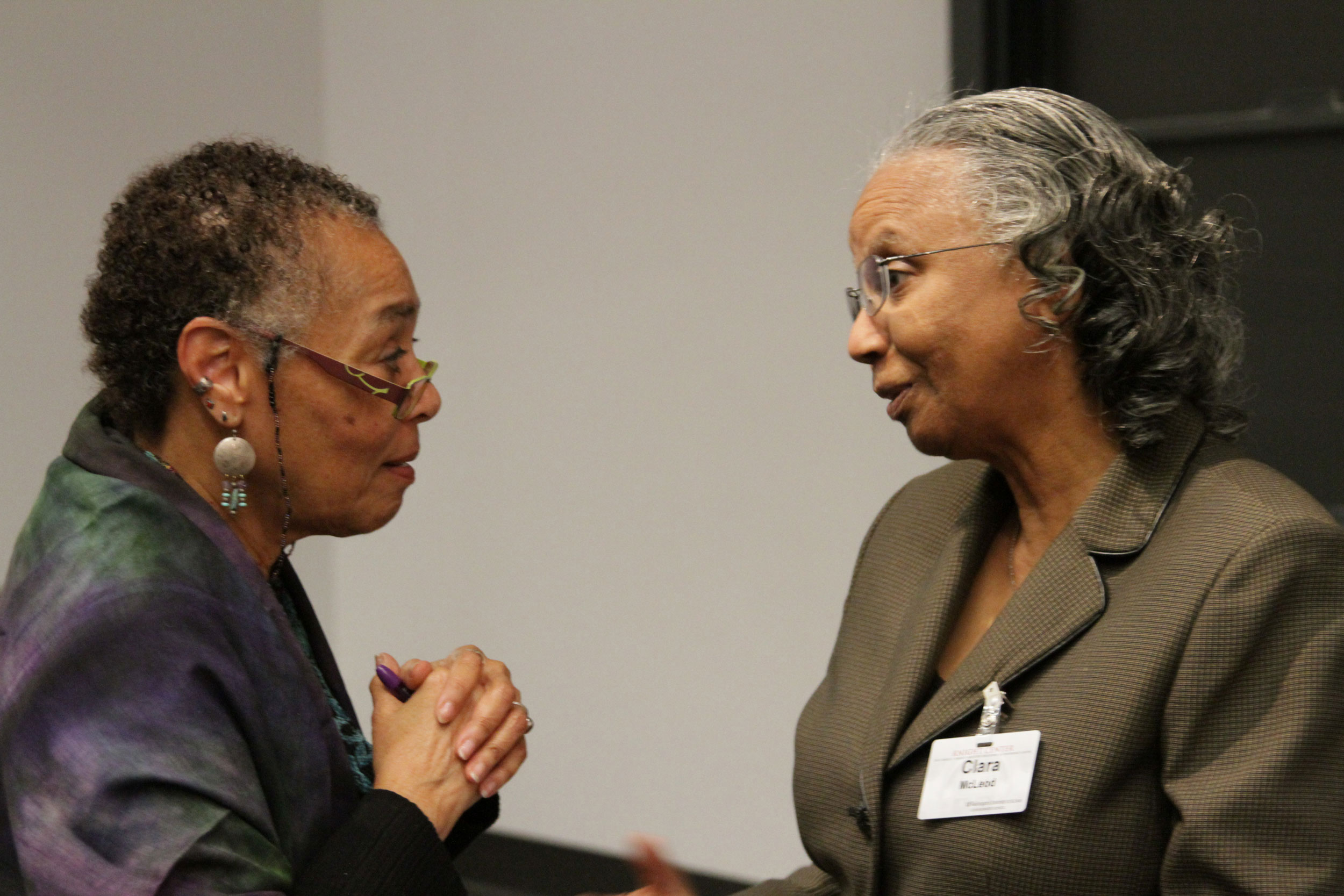 Subject Librarian Clara McLeod speaks with Judy Richardson during the Scarred Justice event.