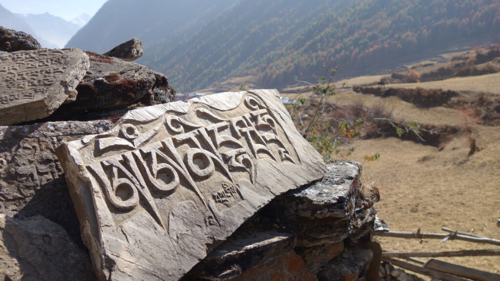 A directional carving on a rock.