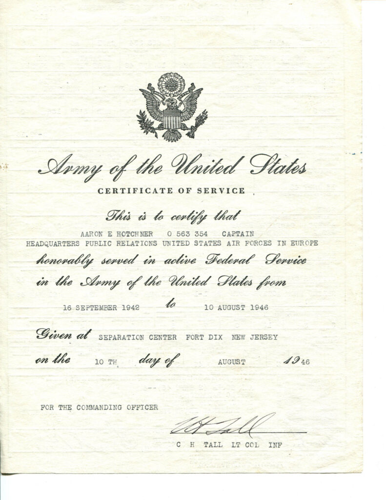 A.E. Hotchner's Army Discharge Papers. The letter has the Great Seal of the United States (a shield with thirteen stars referring to the original thirteen states supported by a bald eale with its wings outstreached; the eagle holds thirteen arrows in its left talon and an olive branch in its right with a scroll clutched in its beak. The scroll typically reads 'E pluribus unum,' or 'Out of Many, One.') and is the letter detailing Hotchner's honorable service and discharge.