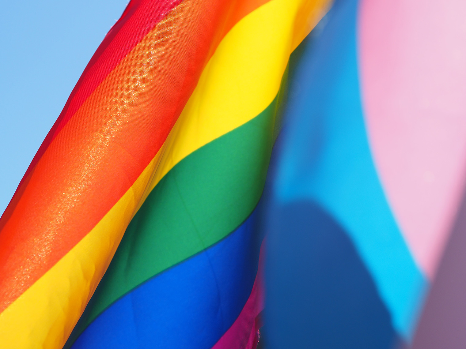 Closeup of a rainbow pride flag.