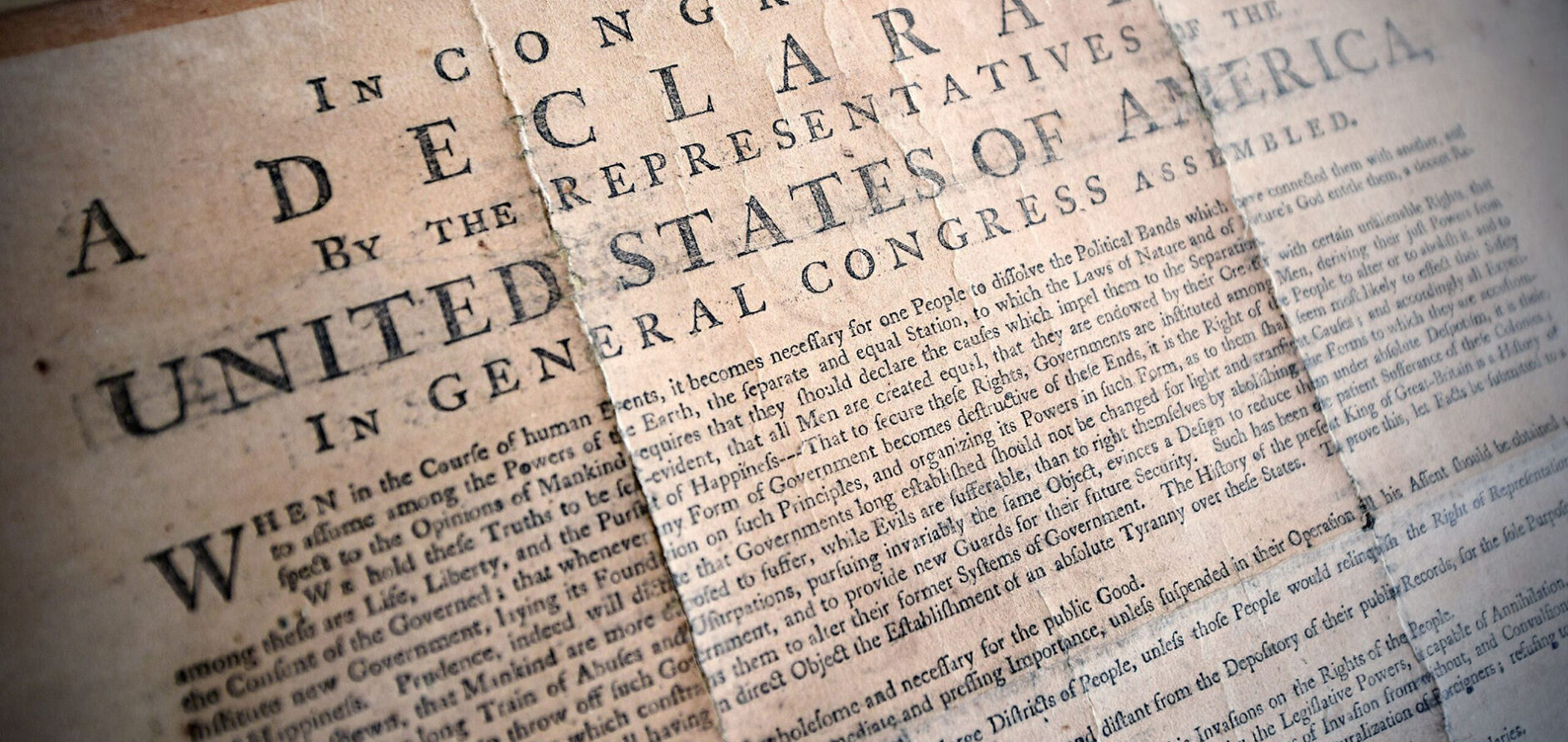 A closeup of a printed copy of the Declaration of Independence.
