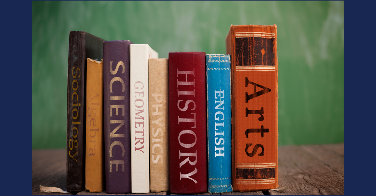 A collection of research books arranged in a row.