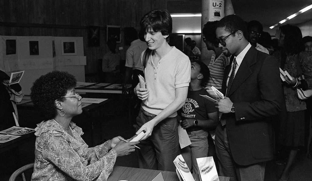 Author Maya Angelou greeting attendees