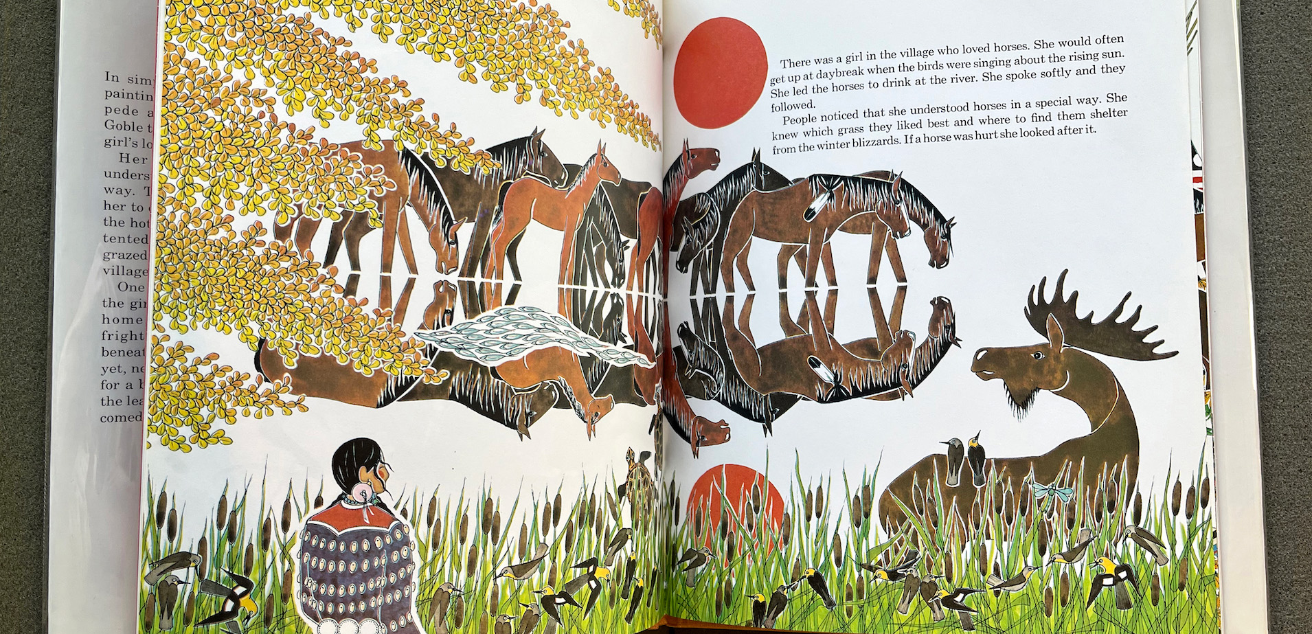 Inside page with illustration of horses, landscape and text.