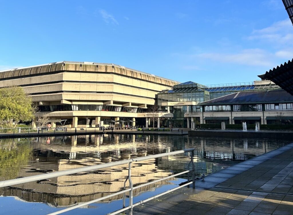 Buildings on the banks of a pond