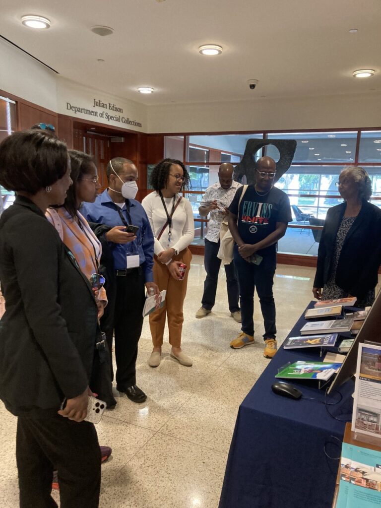 People looking at a books display