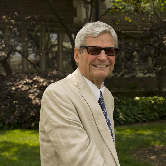 Photo of a man wearing glasses