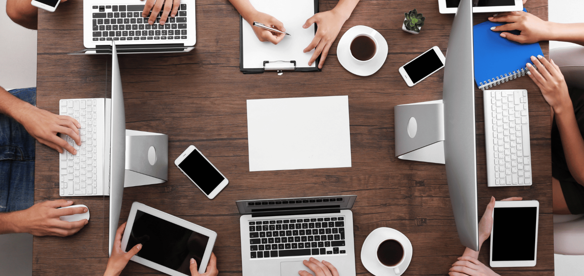 Group of people on laptops.