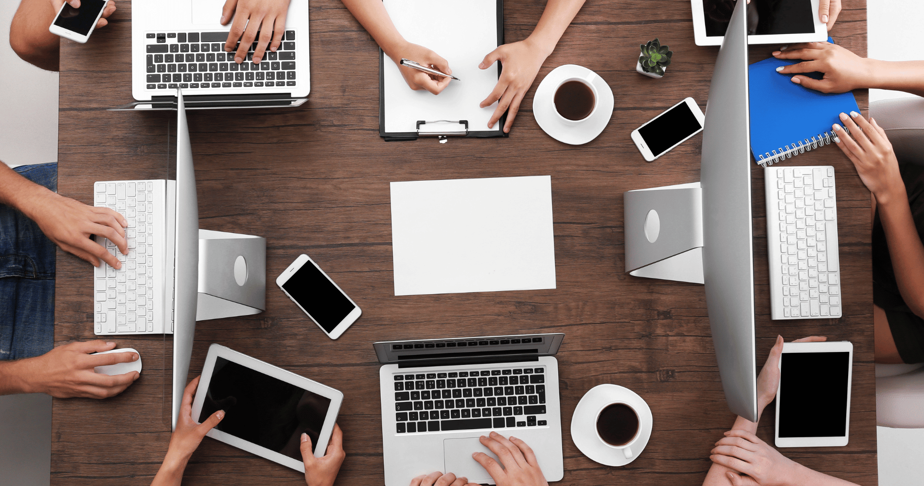 Group of people on laptops.