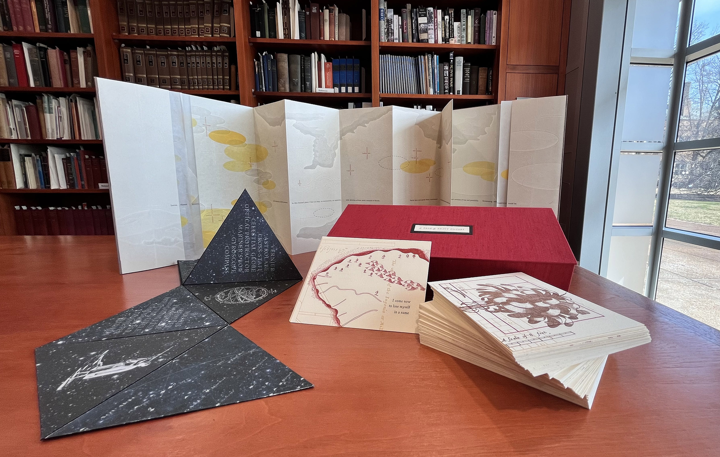 Materials laid out on a table within the Special Collections Reading Room.