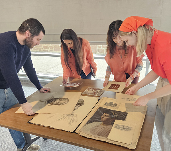 Master of Fine Arts in Illustration and Visual Culture (MFA-IVC) students investigating materials from Special Collections as a part of their Exhibition & Engagement course.