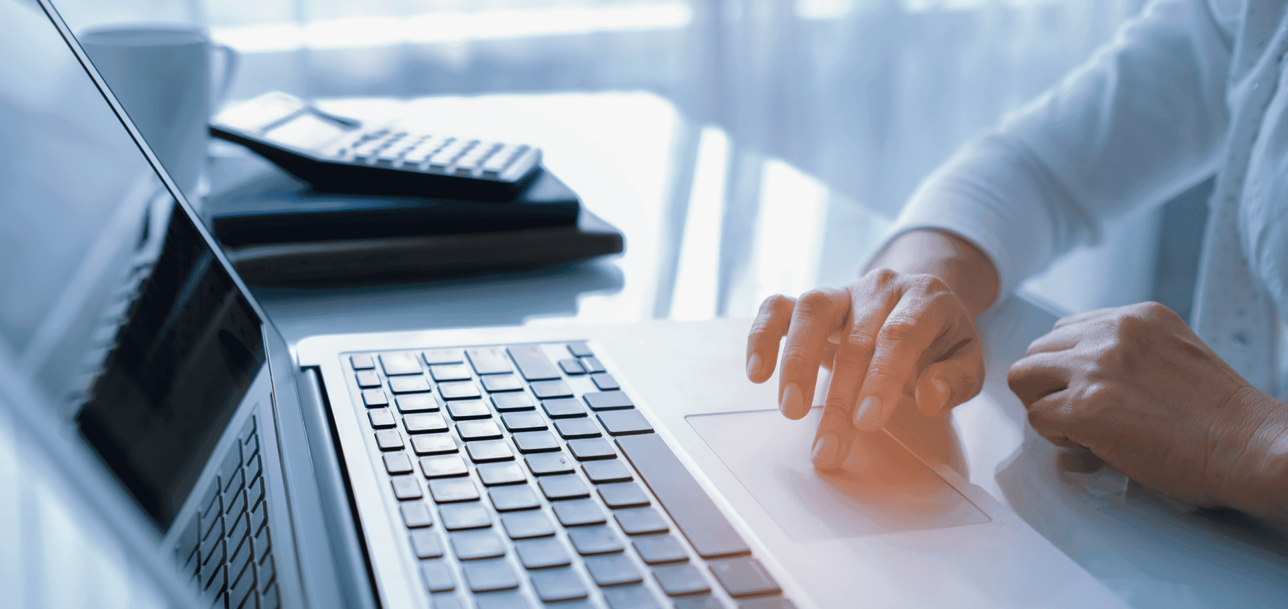 Stock photo of person using laptop computer