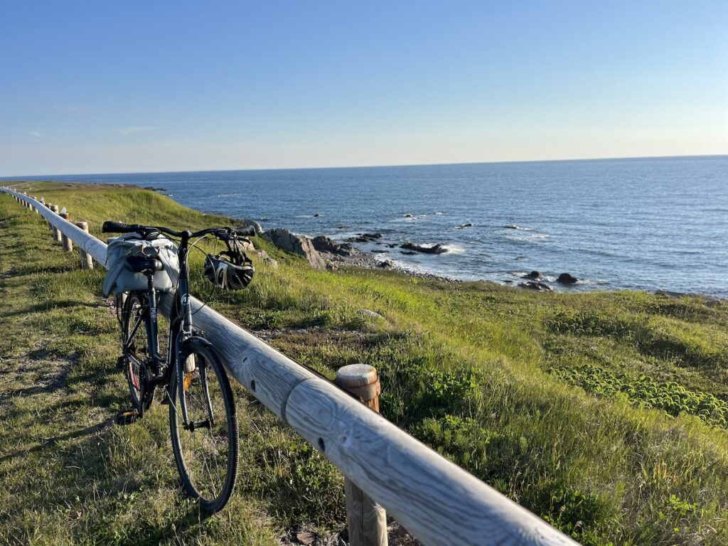 Bike parked near the sea