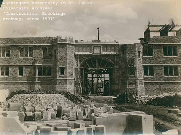 Photo of stonework construction on WashU's Brookings Archway circa 1901 from the University Archives. The first two floors of the building are built and the scaffolding for the arch is present in the photo.