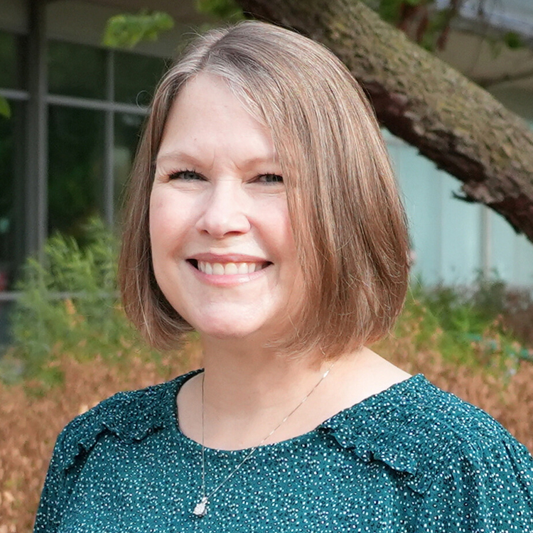 Staff photo of Jamie Emery outside the Olin Library.