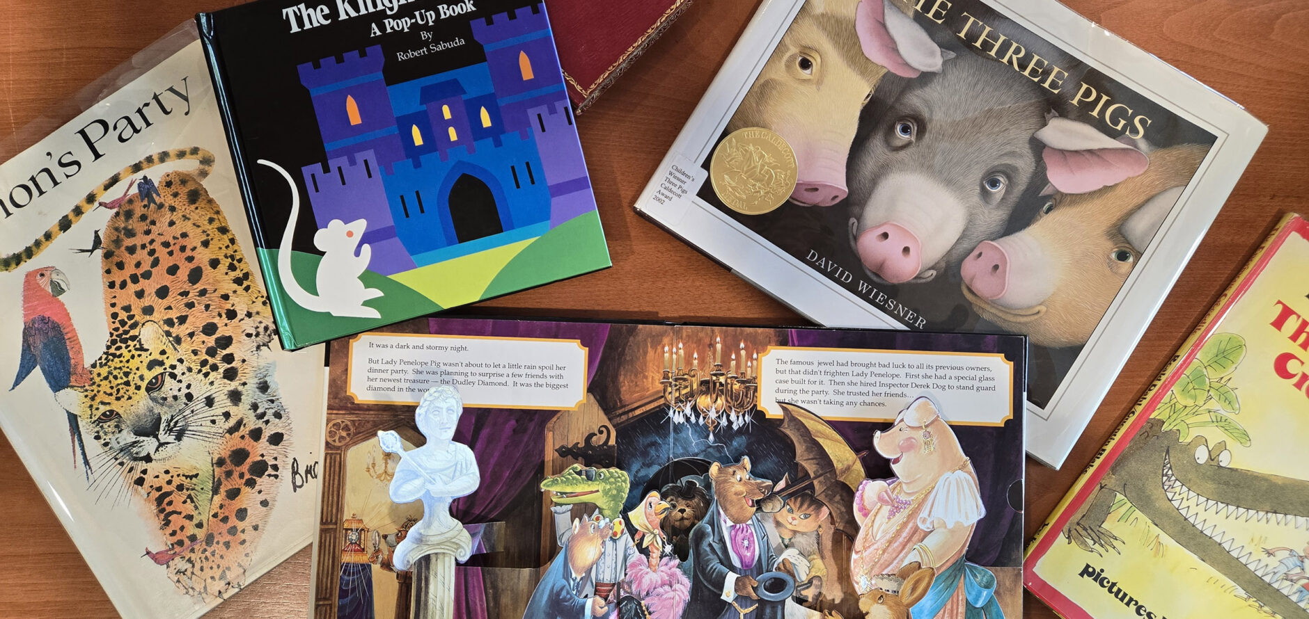 Five allegorical children's books with animals on the covers.