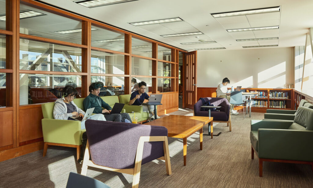 Students studying inside the Harris Reading Room of Olin Library.