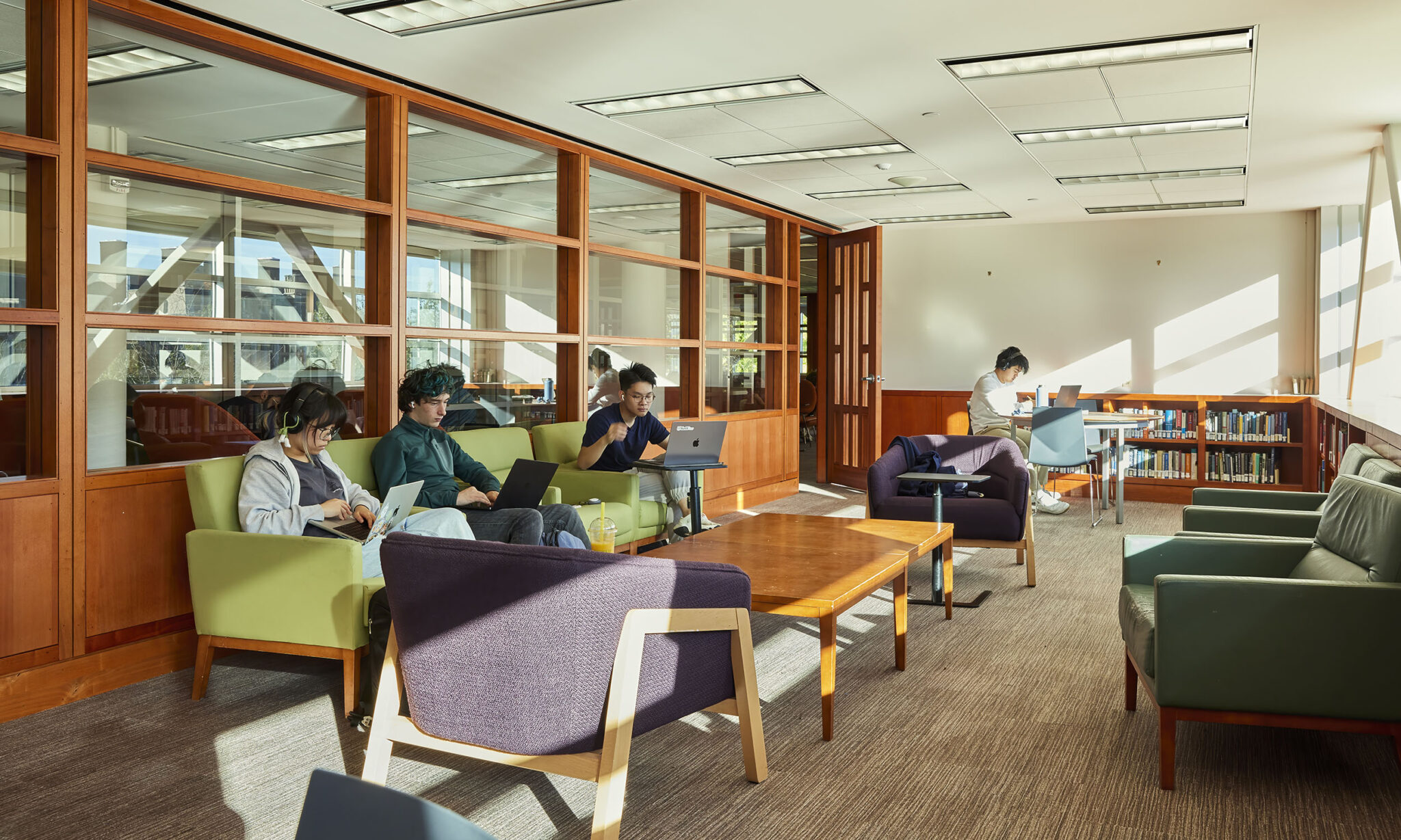 Students studying inside the Harris Reading Room of Olin Library.