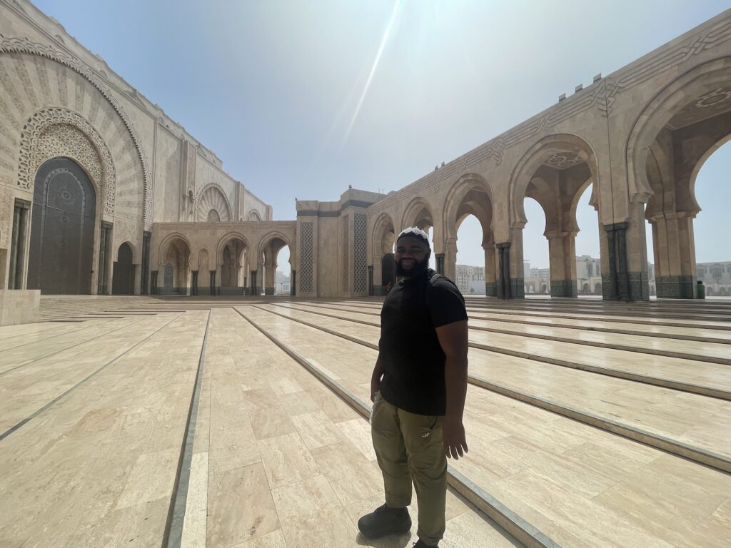 Man standing in the courtyard w