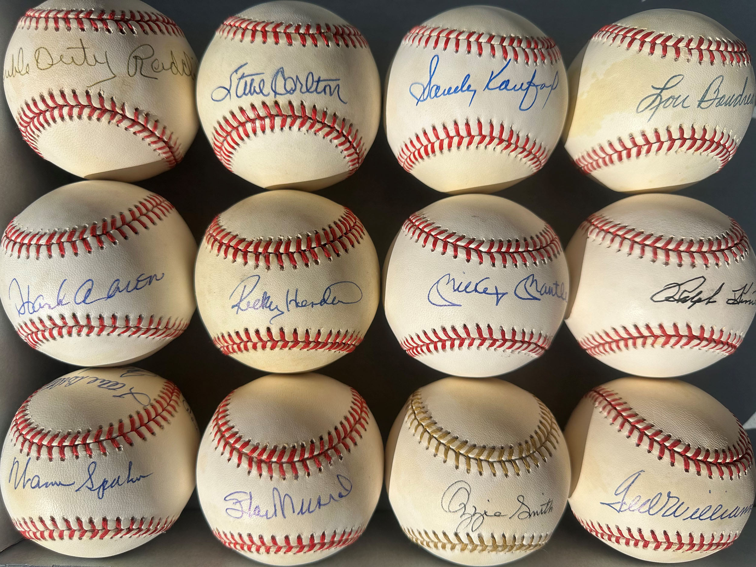 Twelve signed baseballs held within the Sports & Culture Collections.