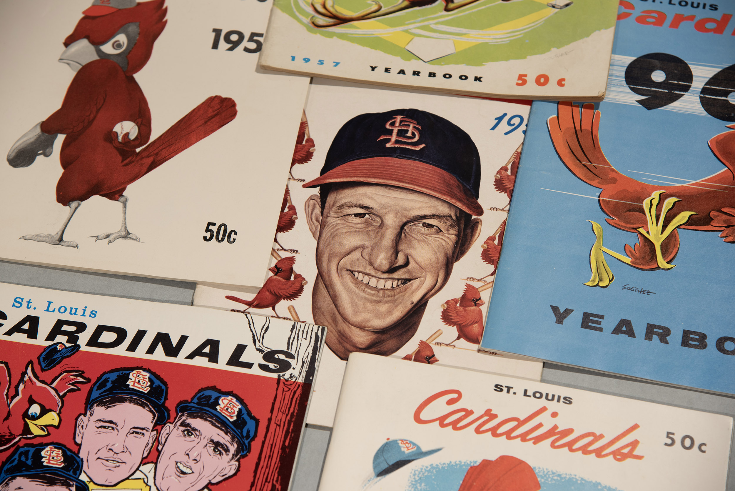 Collage of St. Louis Cardinals baseball paraphernalia.
