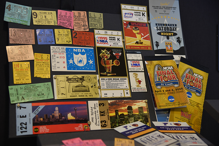 A collage of sports seat tickets.