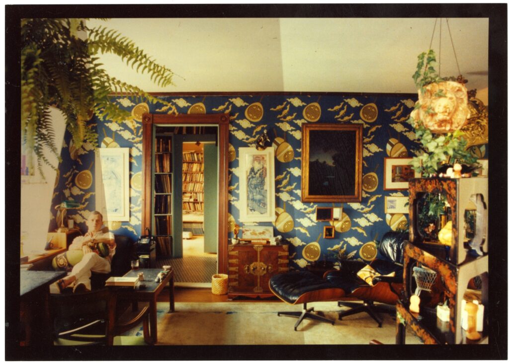 Merrill sitting in a room