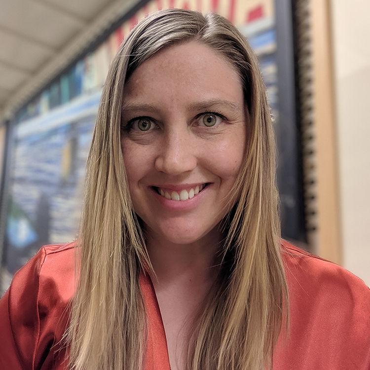 Andrea Degener smiles at the camera.