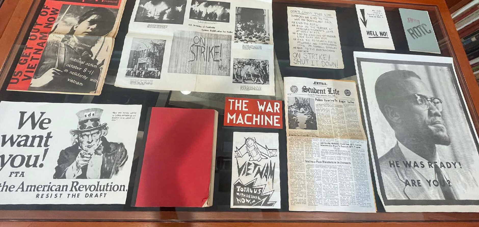 A collage of student protest flyers and materials.