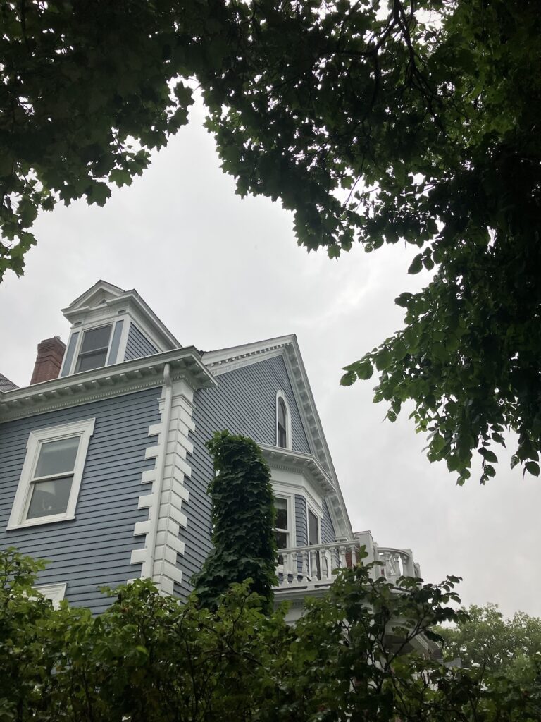 A house with blue shingles