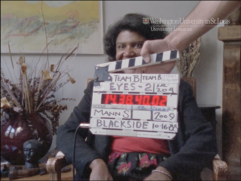 Henry Hampton Eyes on the Prize: America at the Racial Crossroads,1965-1985, film marker clapper in front of an interview subject.