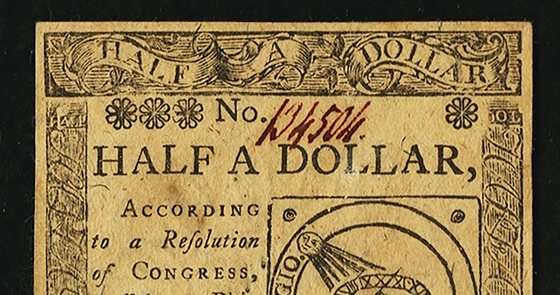 Printed paper declaring it stands for half a dollar according to a resolutio of Congress passed at Philadelphia, February 17, 1776. There is an icon with a moon on a stadium with a typed "Fugio. Mind your business."